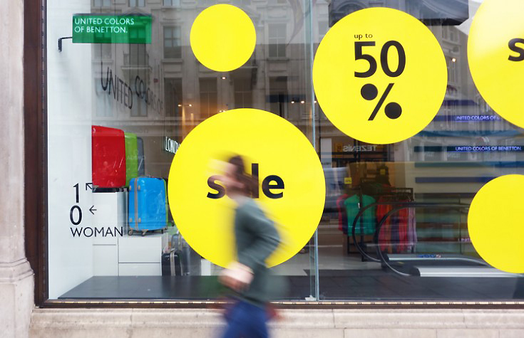 Large window vinyl decals for the Benetton sale, produced by the graphical tree london