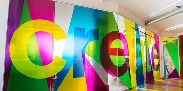 large glass manifestation in beautiful colours by the graphical tree