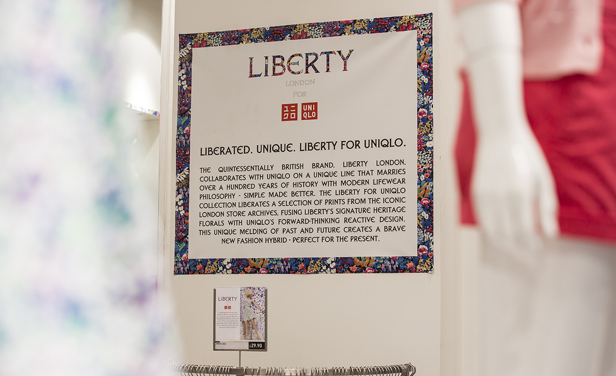 a branded retail sign printed by The Graphical Tree for the Uniqlo & Liberty brands