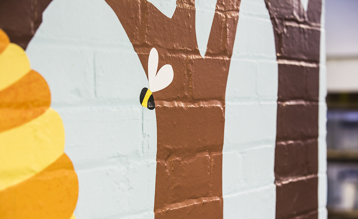 The Graphical Tree Bear Nibbles graphics - printed and cut vinyl to walls and installation London