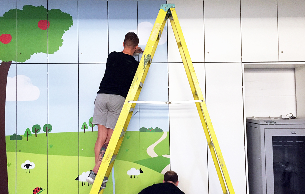 The Graphical Tree Bear Nibbles graphics - printed and cut vinyl to walls and installation London