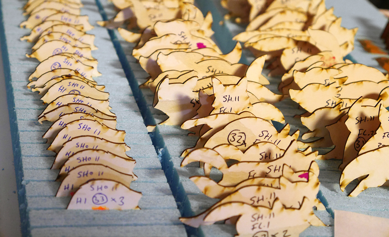 The laser cut out animals for the John Lewis advert, placed in packaging and labelled