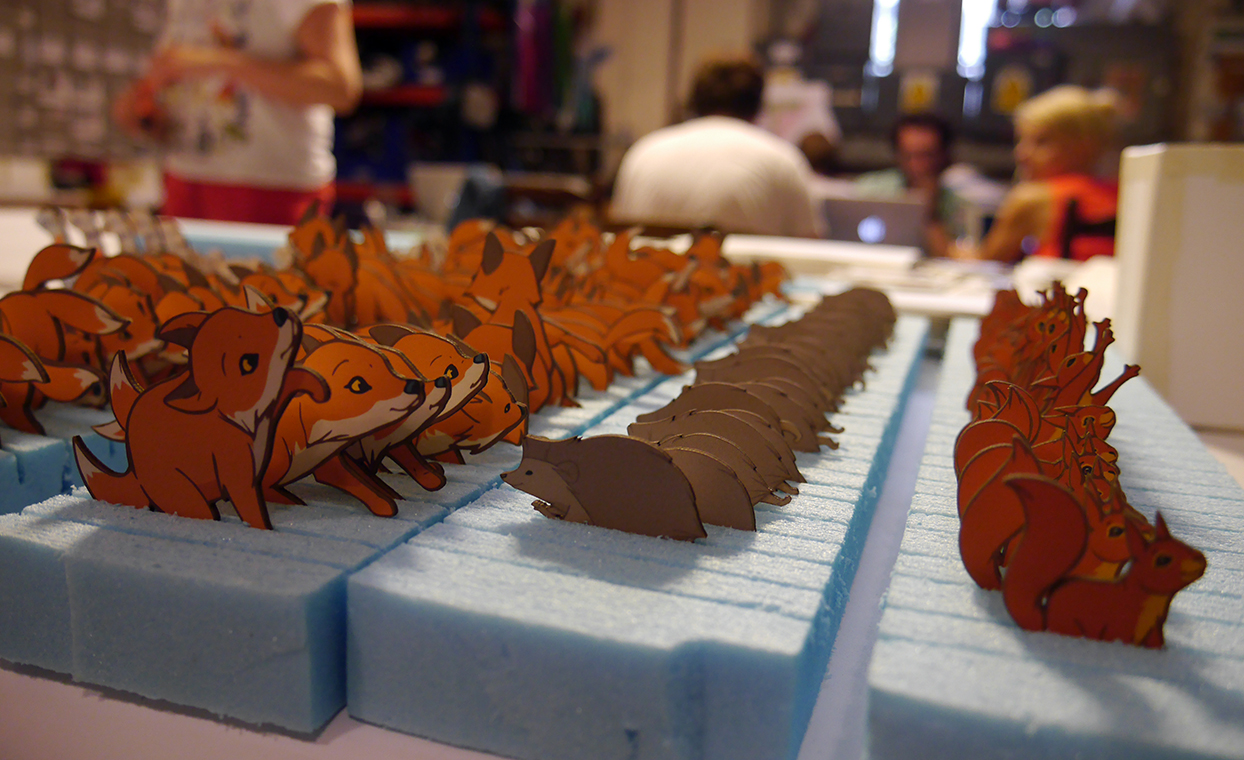 Foxes, Hedgehogs, Squirrels printed animation stills lined up ready for placing in John Lewis tv ad