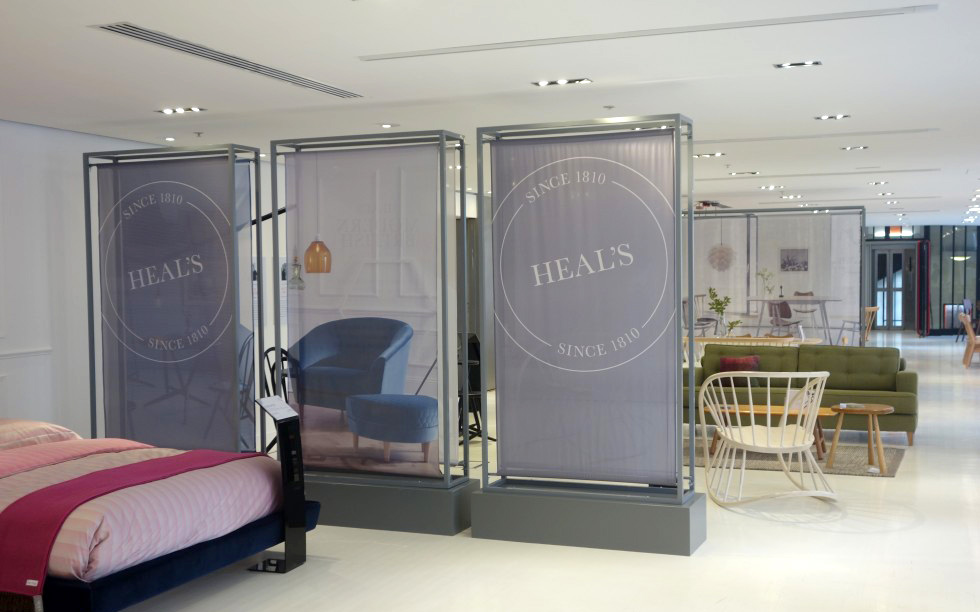 Retail visual Merchandising design p.o.s. prop fabrication print and installation Heals London