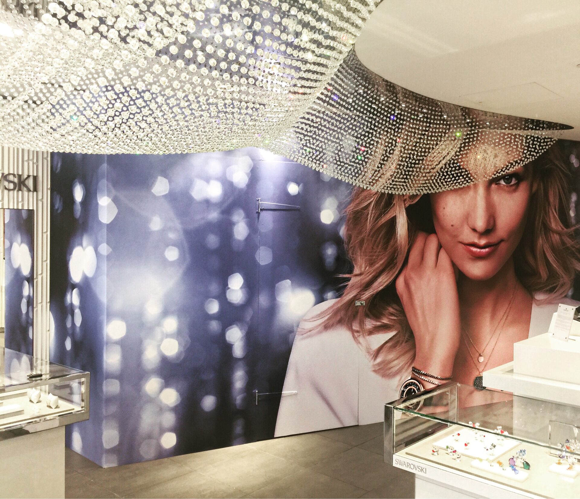 Retail visual Merchandising design p.o.s. prop fabrication print and installation Swarovski London 