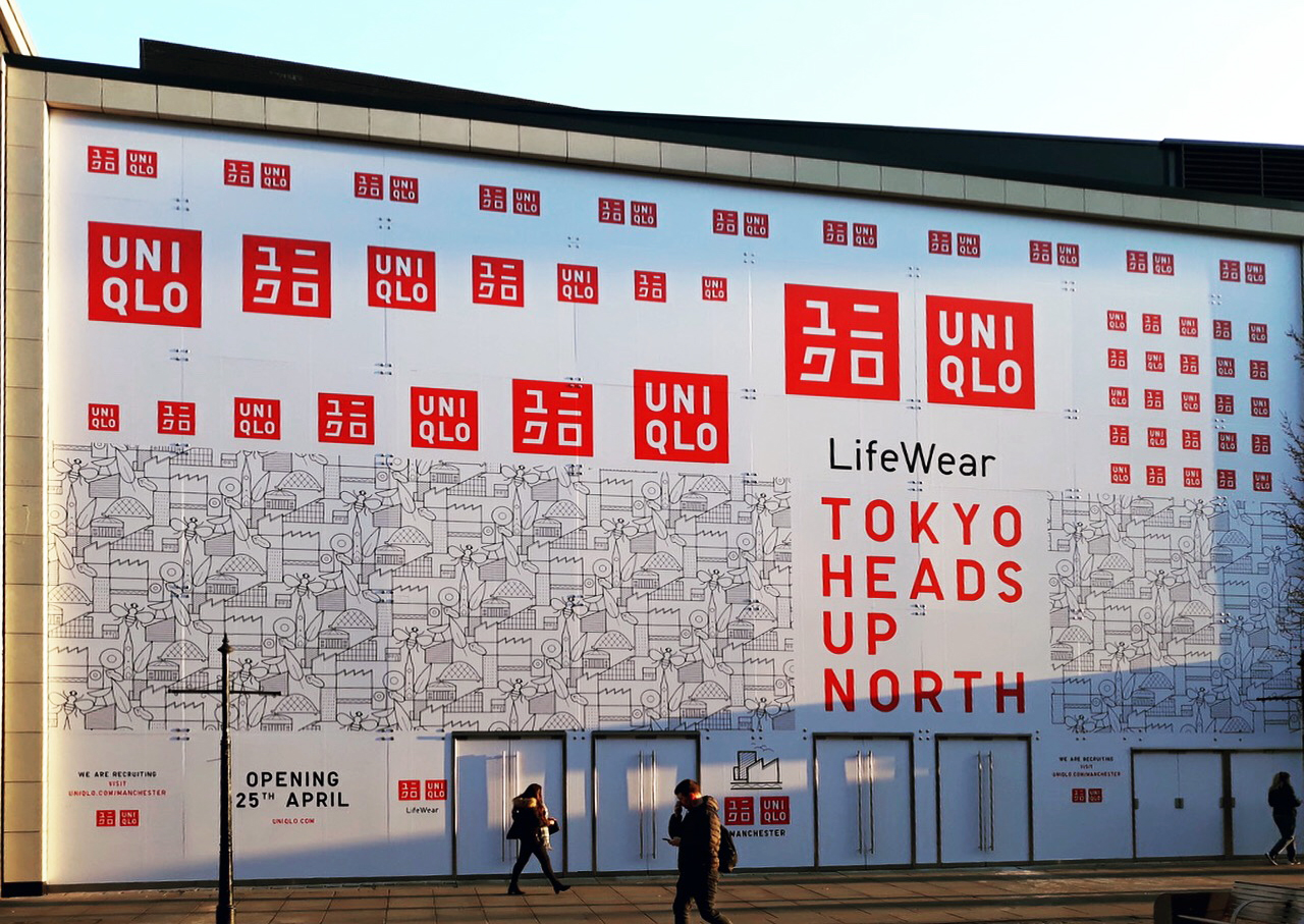 Uniqlo retail brand hoarding graphics printed and installed in Manchester