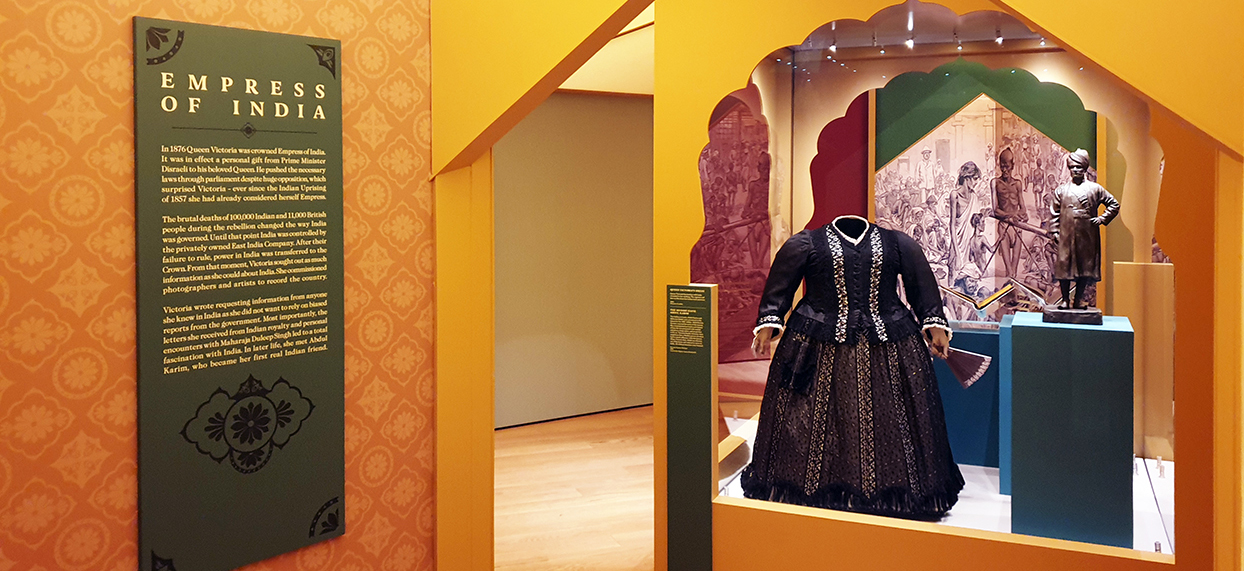 empress of india clothing & signage next to the clothing for the woman & crown exhibition