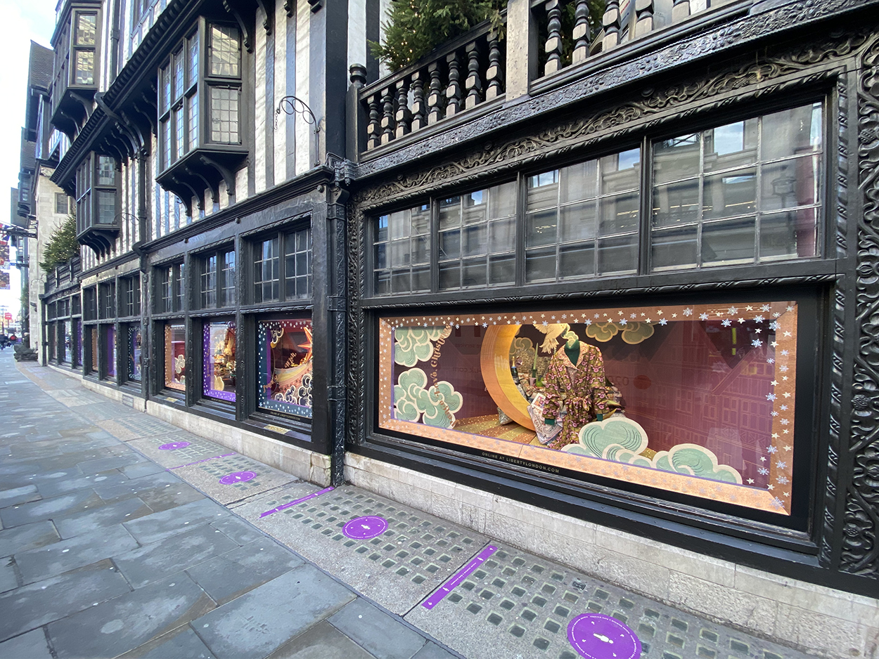 Street view, external building of the Christmas window scenes in Liberty in London