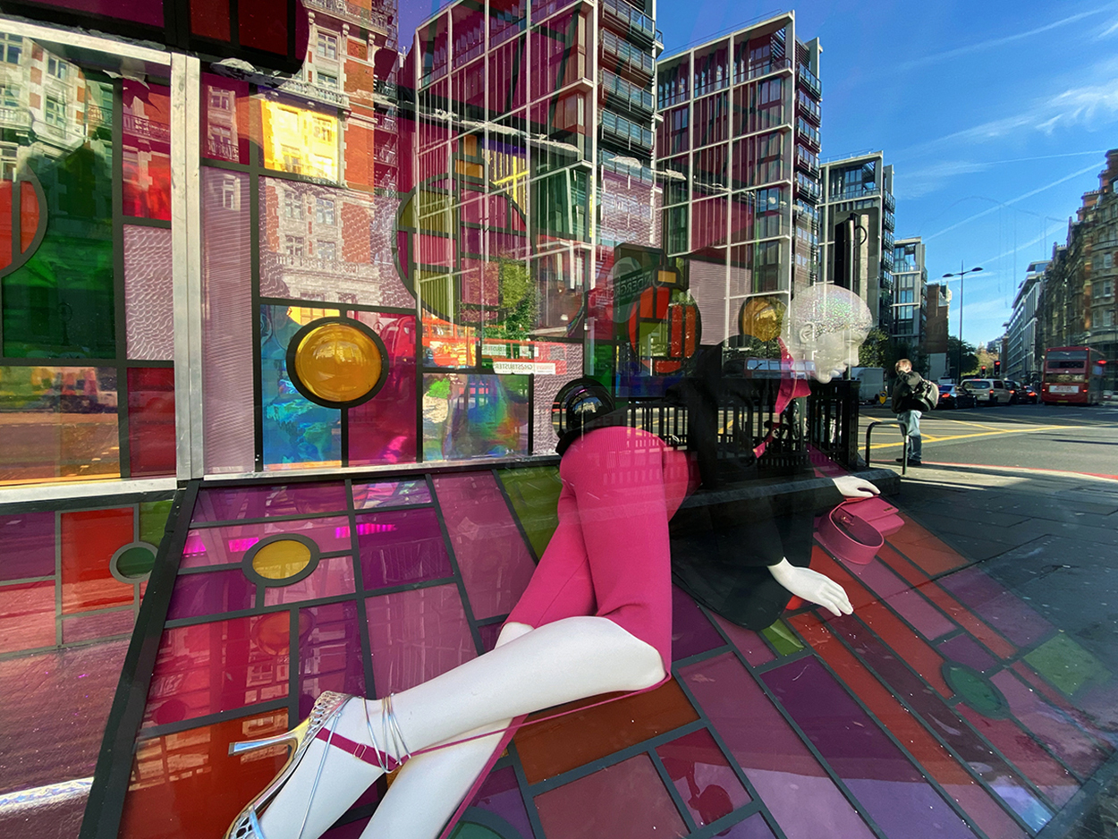 The window display for Harvey Nichols using PVC print bright colours