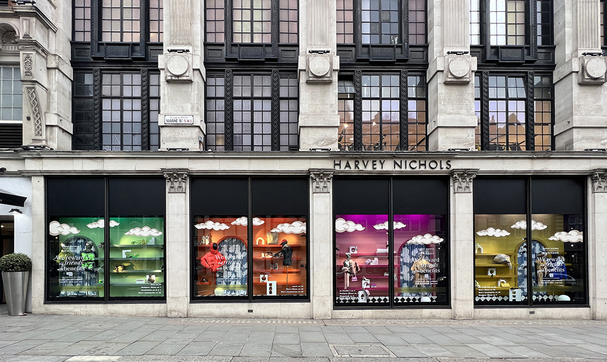 Harvey Nichols in London, shopfront windows displaying the rewards campaign, friends with benefits