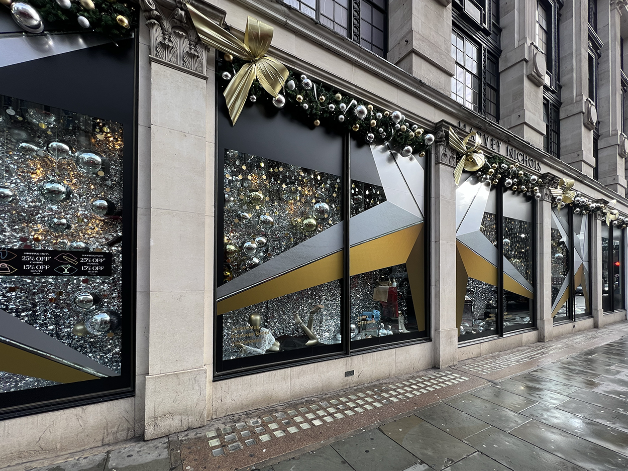 large format Christmas window display graphics with gold, silver, metalic theme for Harvey Nichols