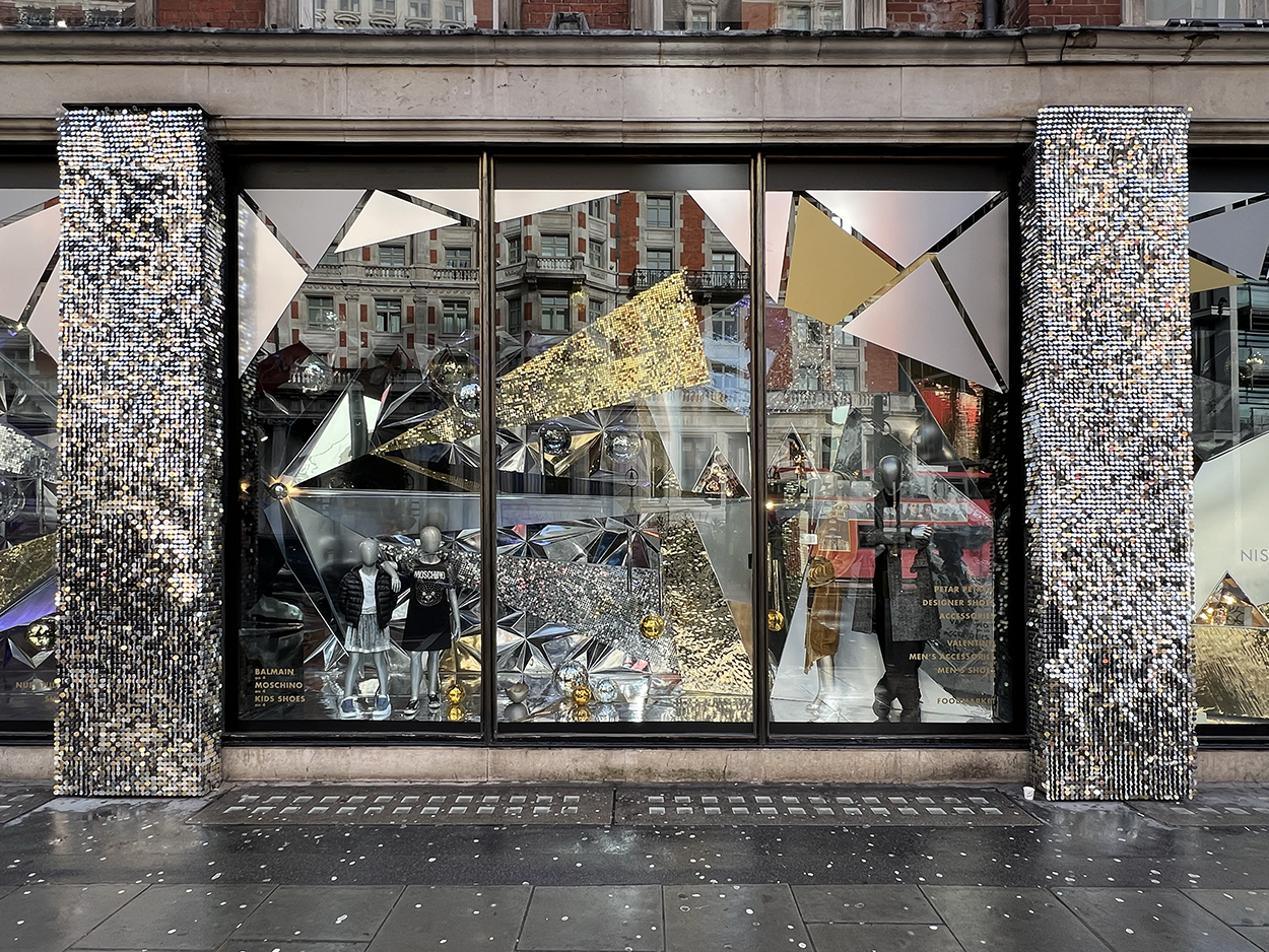 Harvey Nichols Christmas windows featuring disco ball metallic frames
