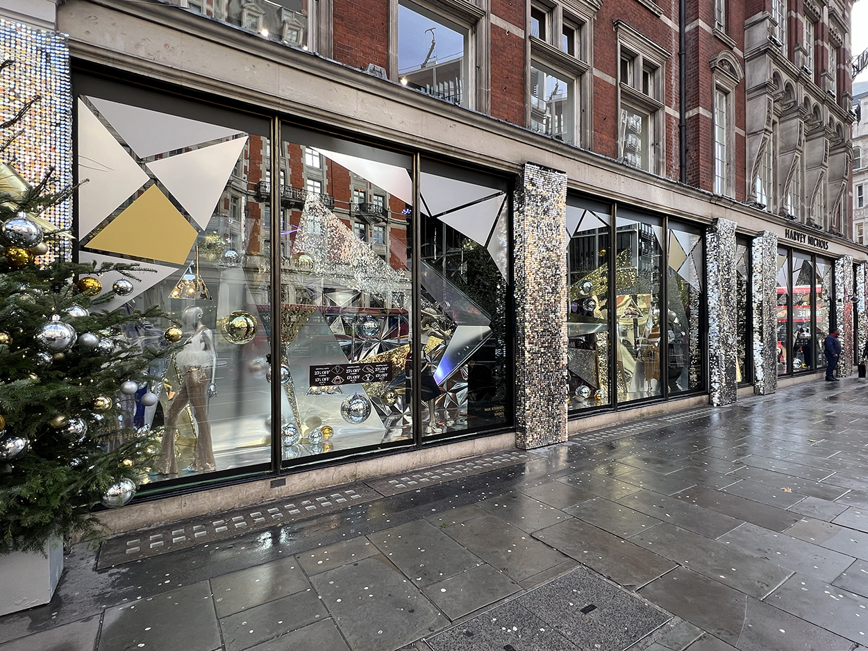 retail windows in Knightsbridge featuring the metallic window display for Harvey Nichols