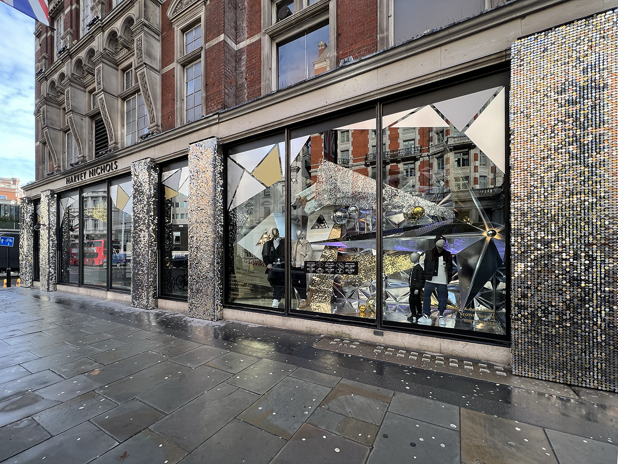 sequin panels, metallic window graphics that shine into the streets of Knightsbridge at Christmas