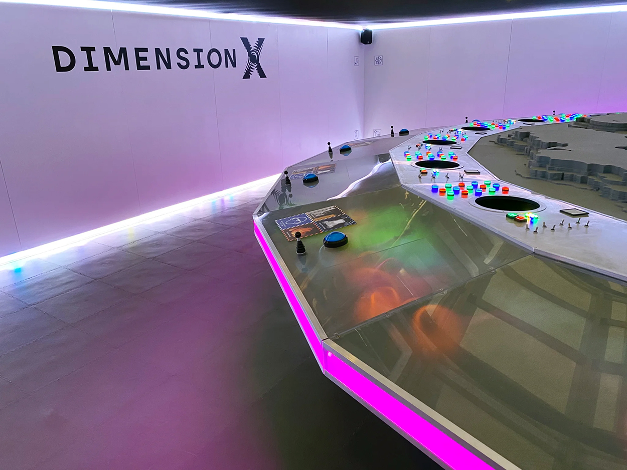 Inside Dimension X's museum exhibition stand - graphics providing by TGT